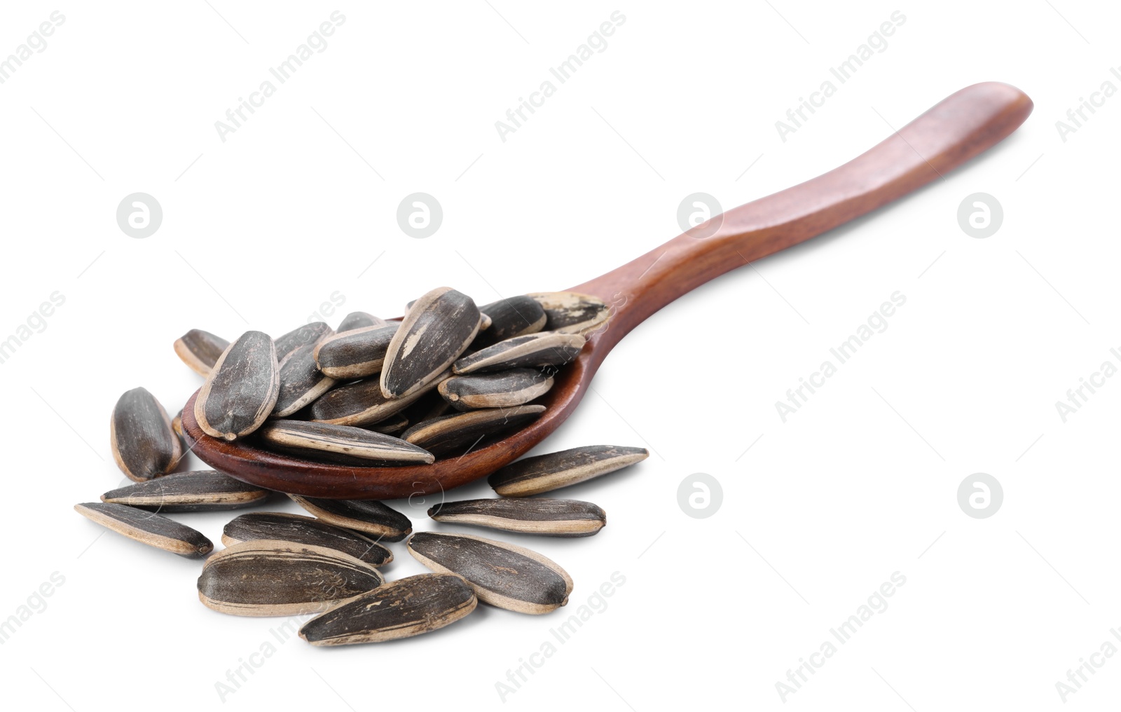 Photo of Sunflower seeds in wooden spoon isolated on white