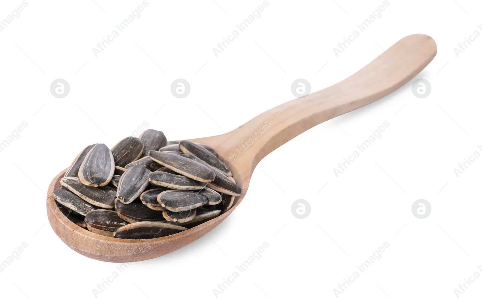 Photo of Sunflower seeds in wooden spoon isolated on white