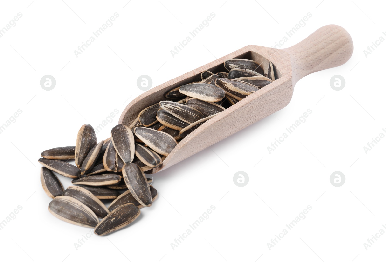 Photo of Sunflower seeds in wooden scoop isolated on white