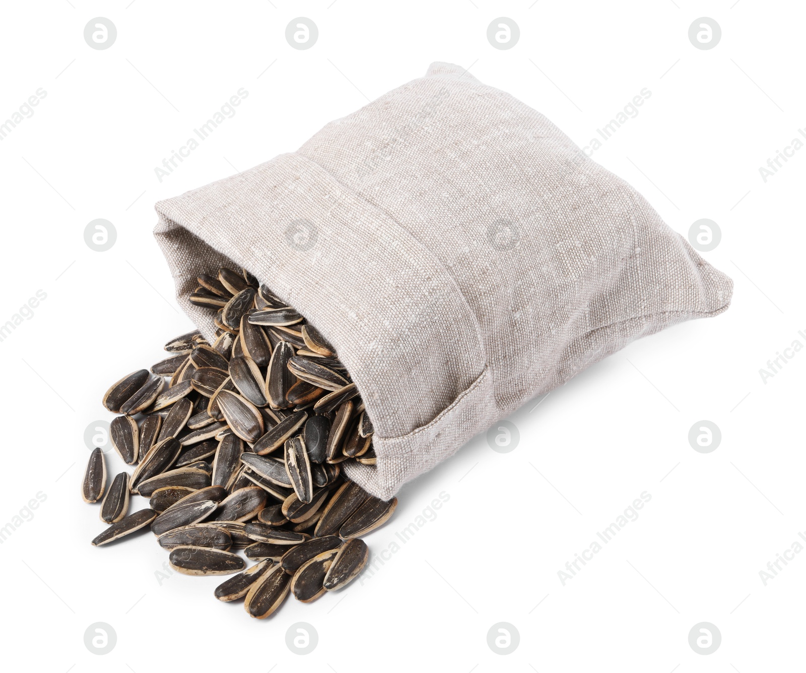 Photo of Sunflower seeds and overturned burlap sack isolated on white