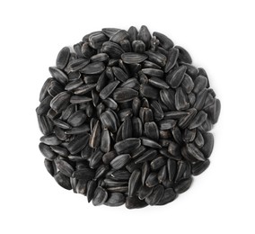 Photo of Pile of sunflower seeds isolated on white, top view