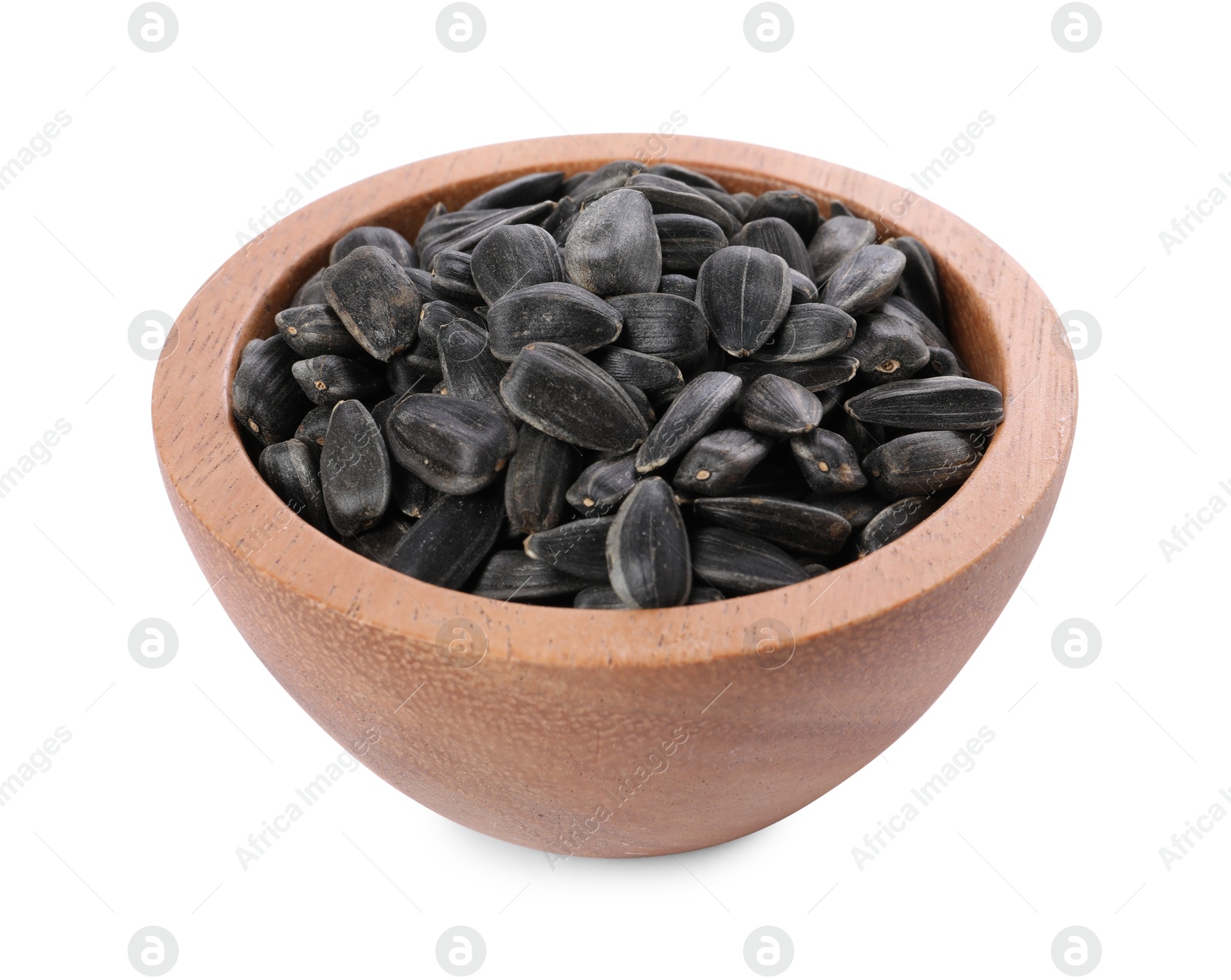 Photo of Sunflower seeds in wooden bowl isolated on white