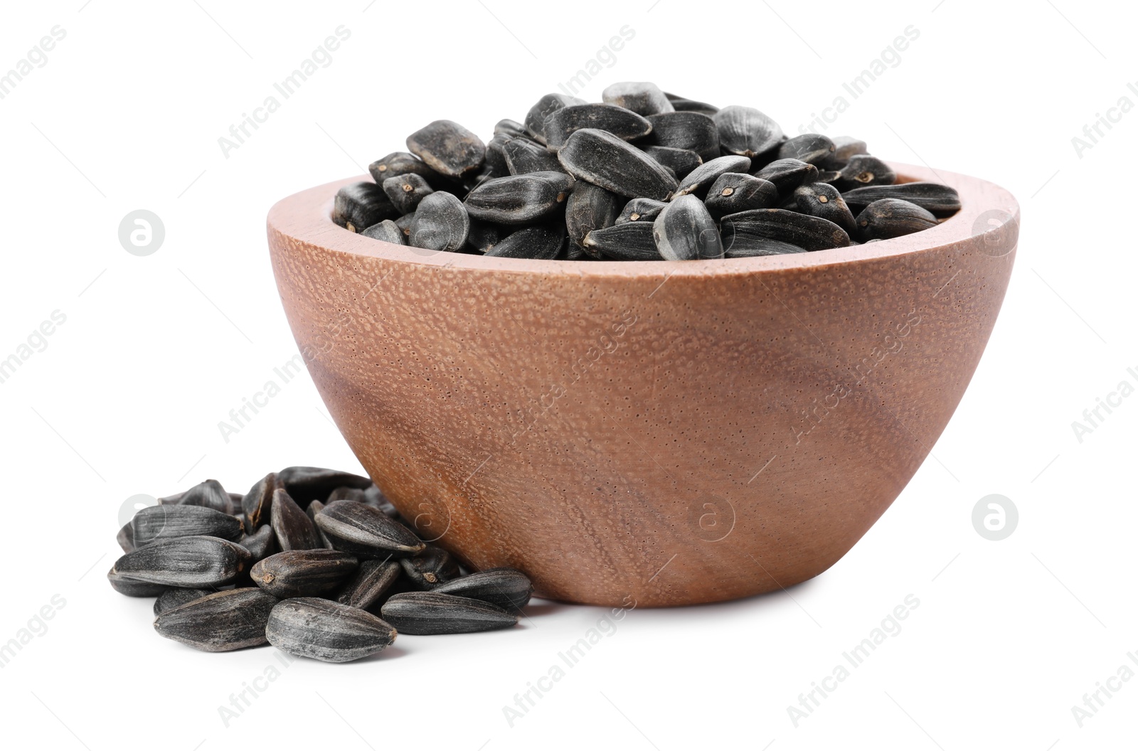 Photo of Sunflower seeds in wooden bowl isolated on white