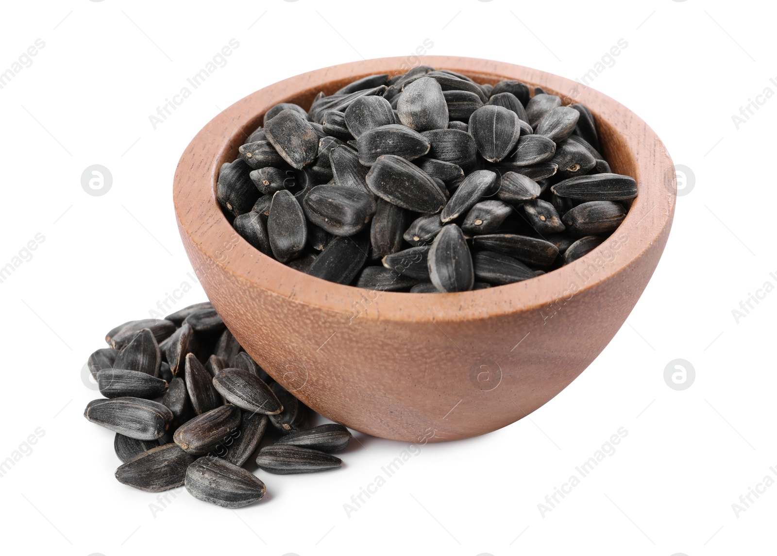 Photo of Sunflower seeds in wooden bowl isolated on white