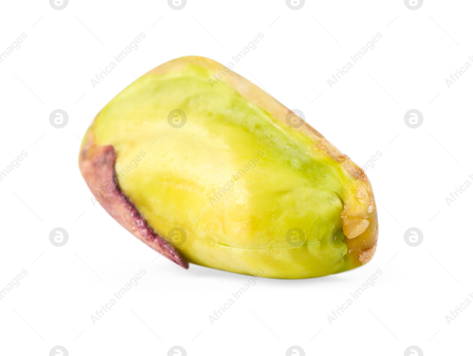 Photo of One peeled pistachio nut isolated on white