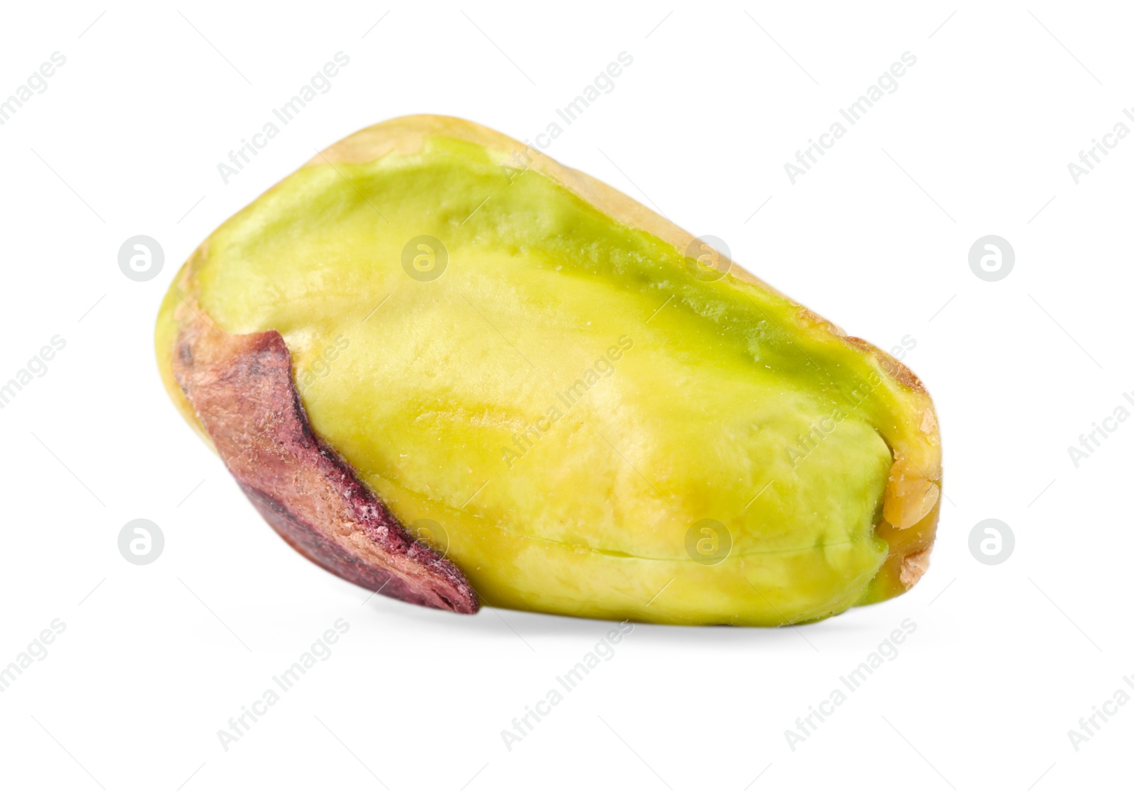 Photo of One peeled pistachio nut isolated on white