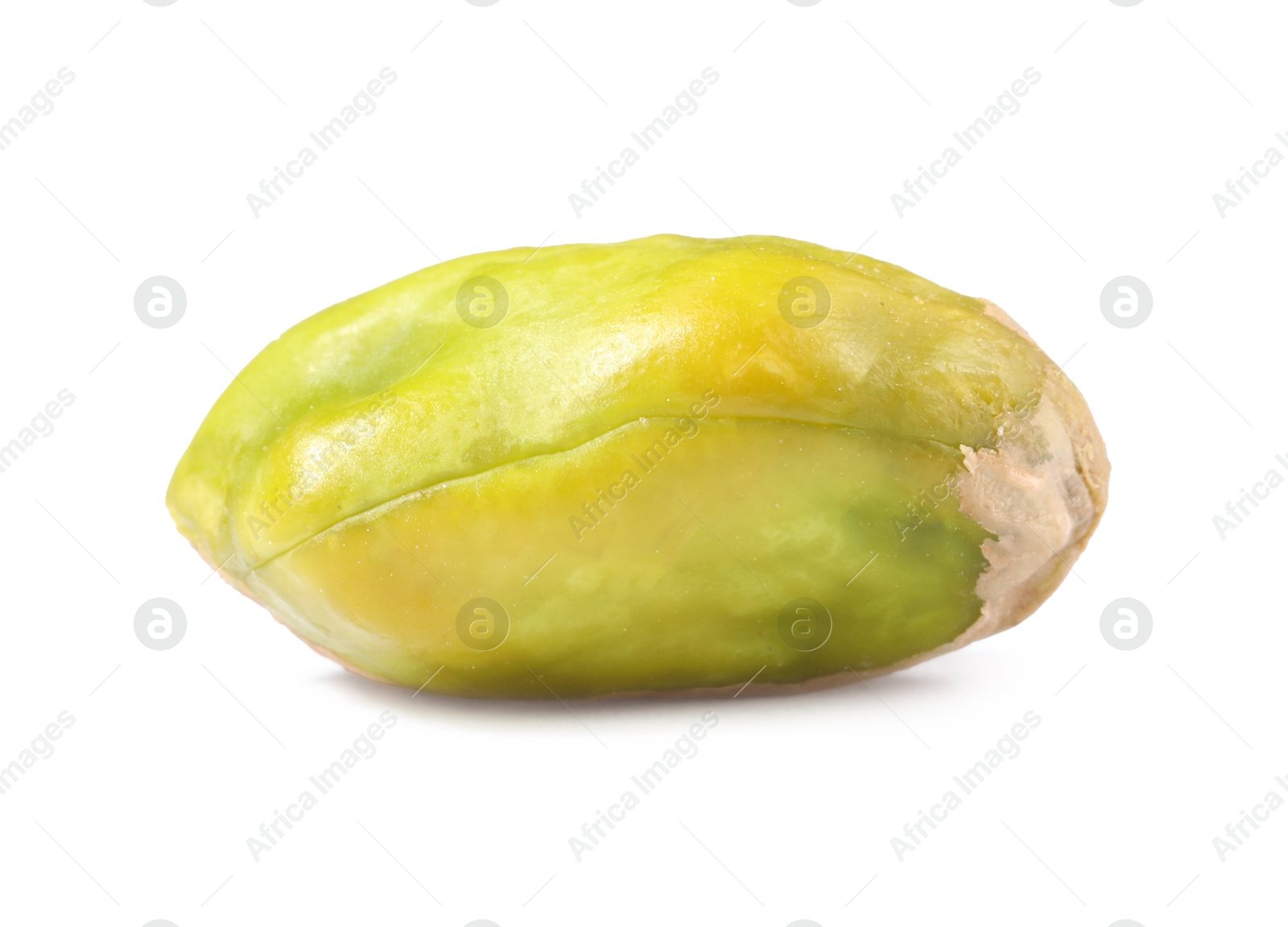 Photo of One peeled pistachio nut isolated on white