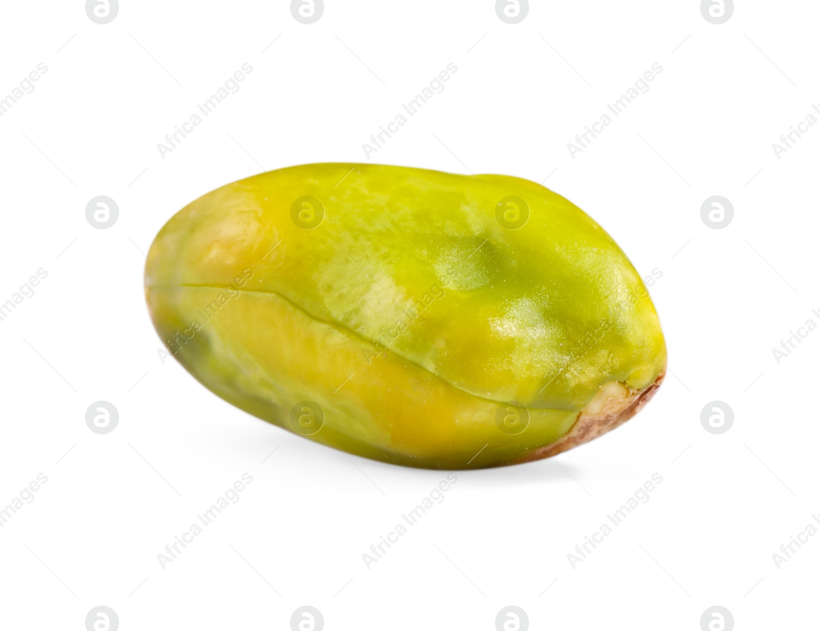 Photo of One peeled pistachio nut isolated on white