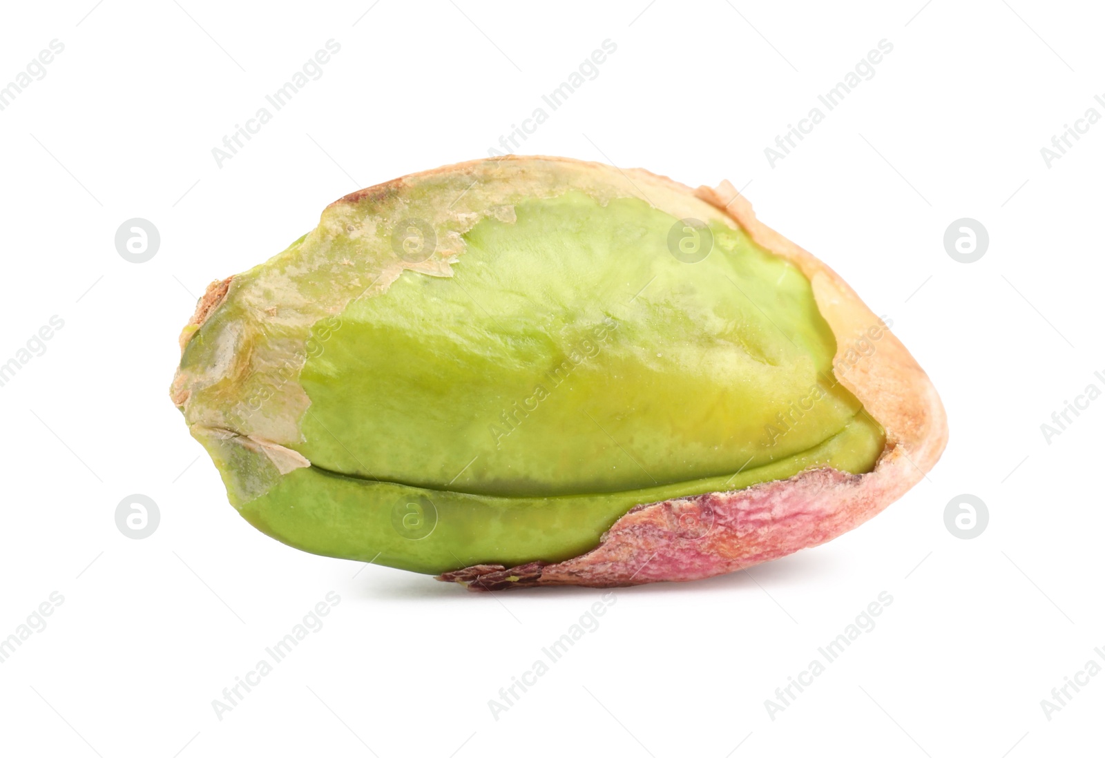 Photo of One peeled pistachio nut isolated on white