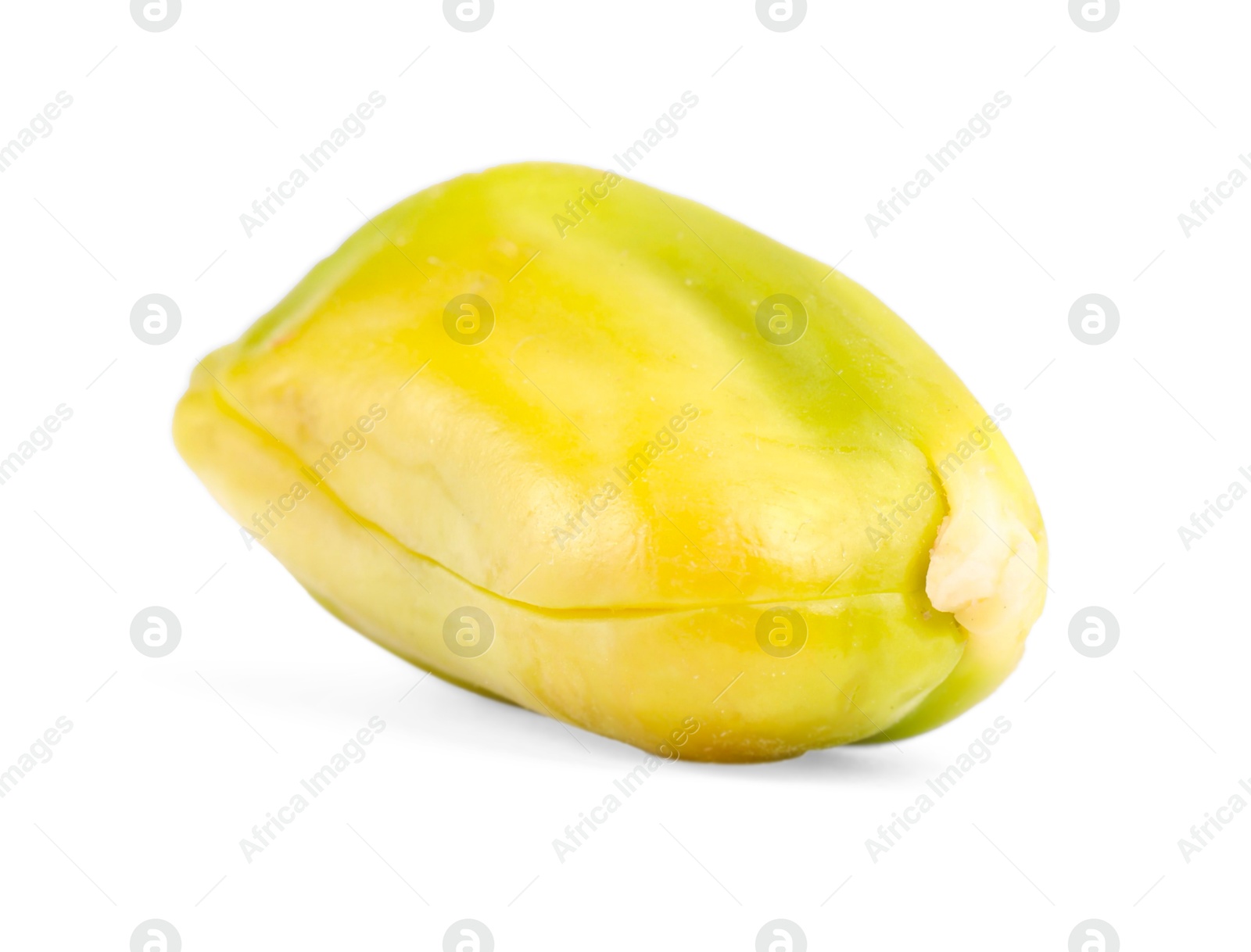 Photo of One peeled pistachio nut isolated on white