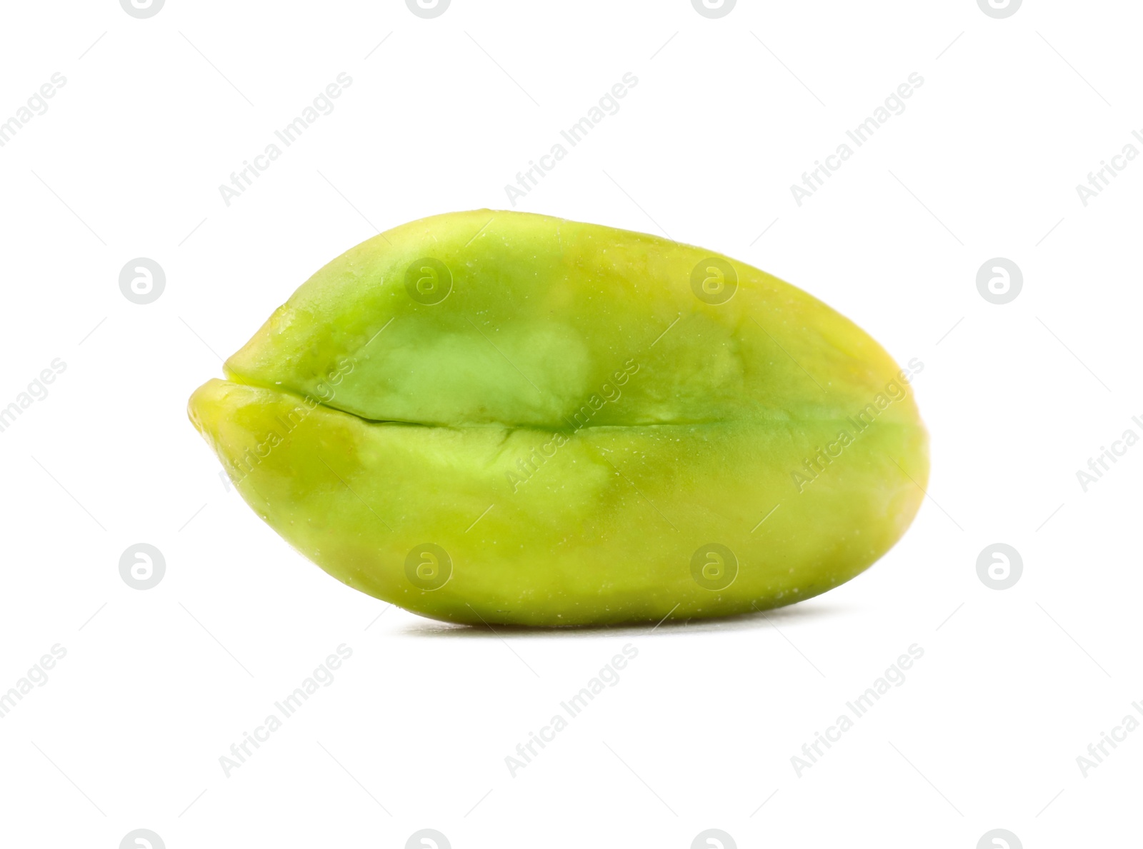 Photo of One peeled pistachio nut isolated on white