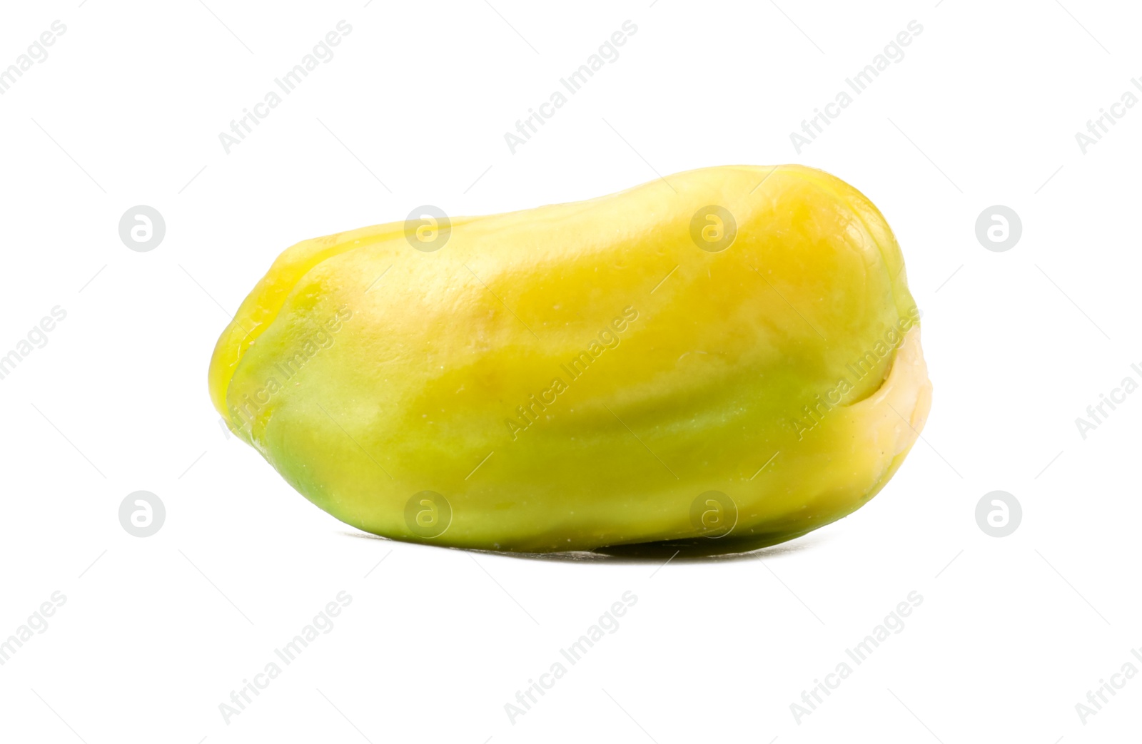 Photo of One peeled pistachio nut isolated on white