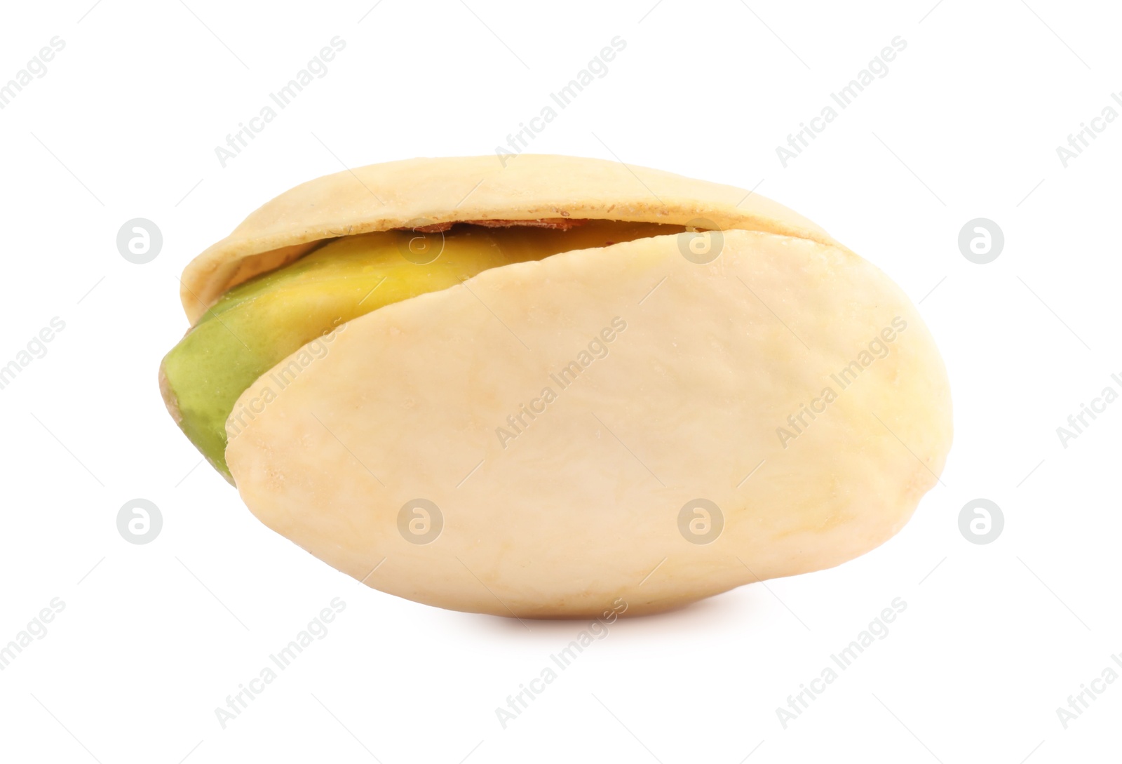 Photo of One tasty pistachio nut isolated on white