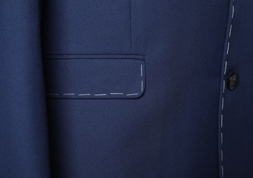 Blue semi-ready jacket with pocket, closeup view