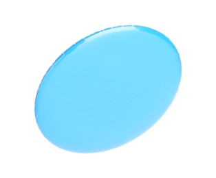 Photo of One light blue button badge isolated on white