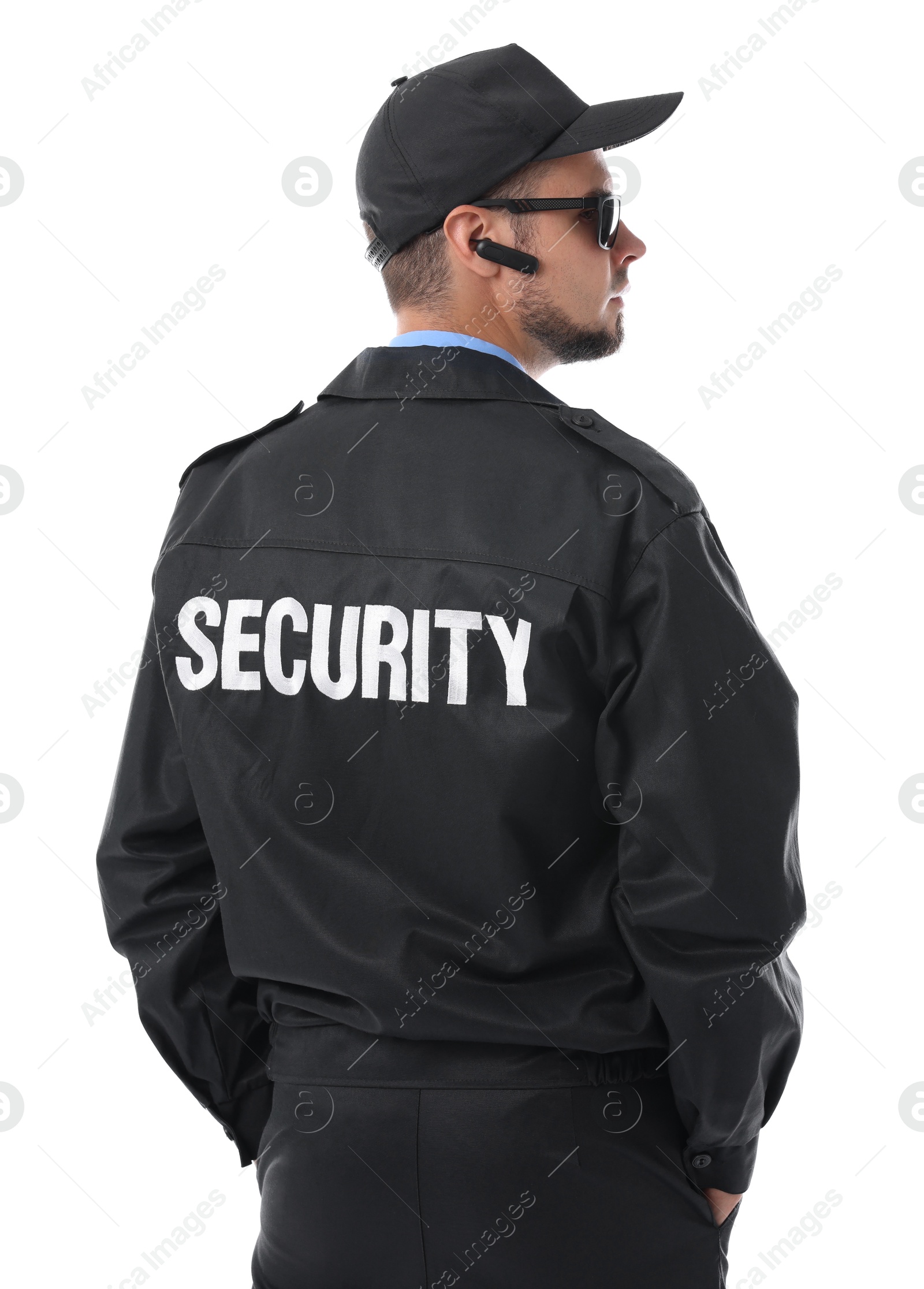 Photo of Security guard in uniform and earpiece isolated on white