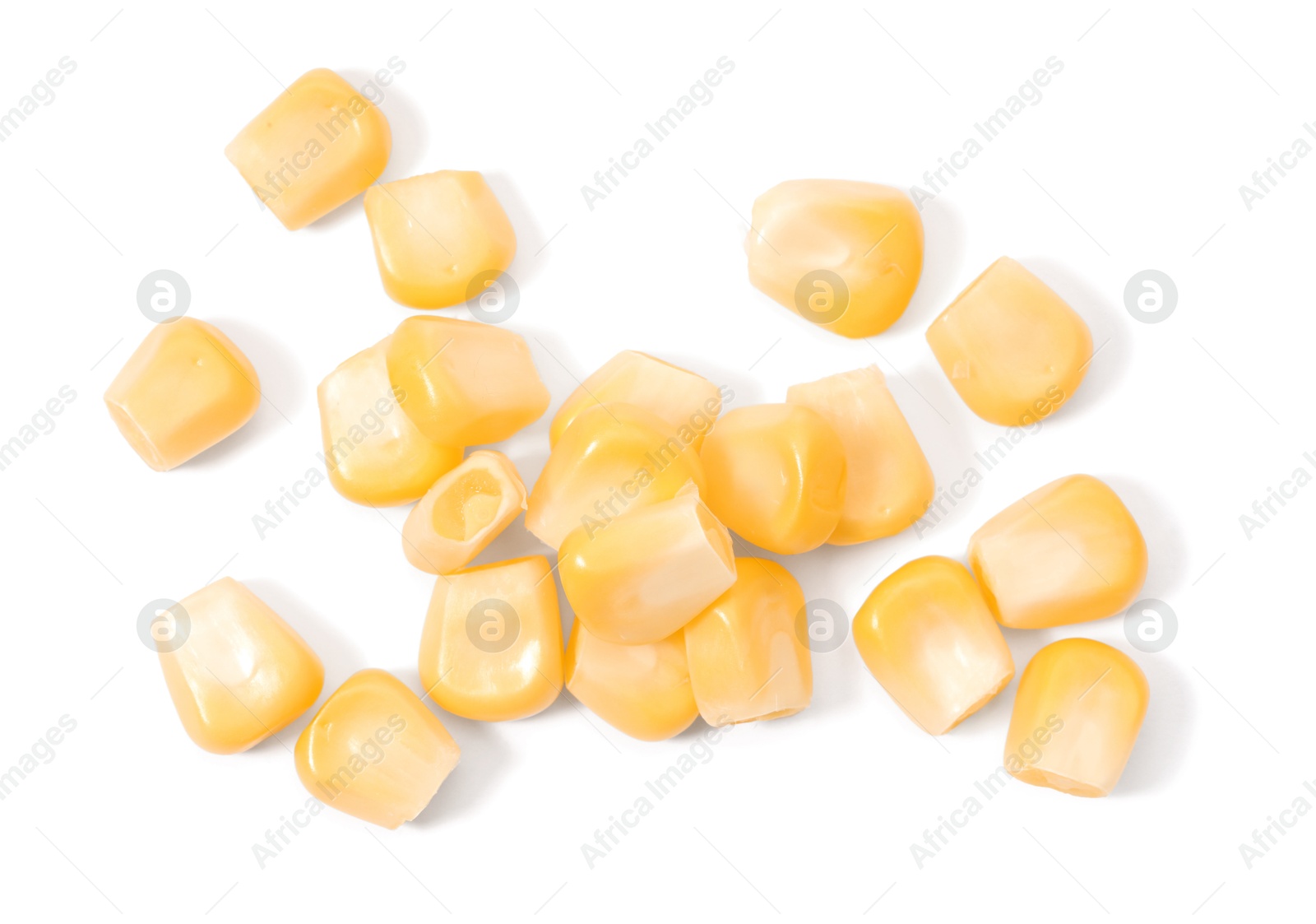 Photo of Pile of fresh corn kernels on white background, top view