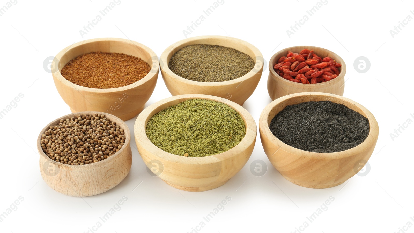 Photo of Different superfood powders in bowls isolated on white