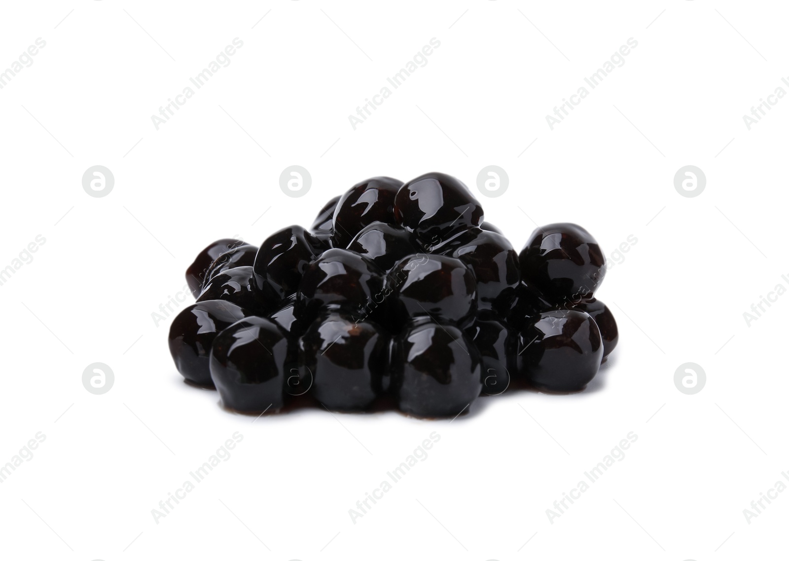 Photo of Pile of dark tapioca pearls isolated on white