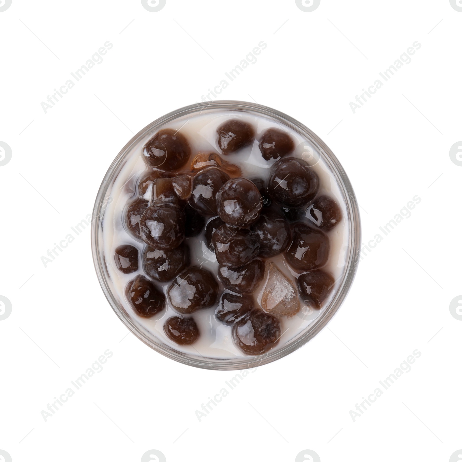 Photo of Tasty milk bubble tea in glass isolated on white, top view