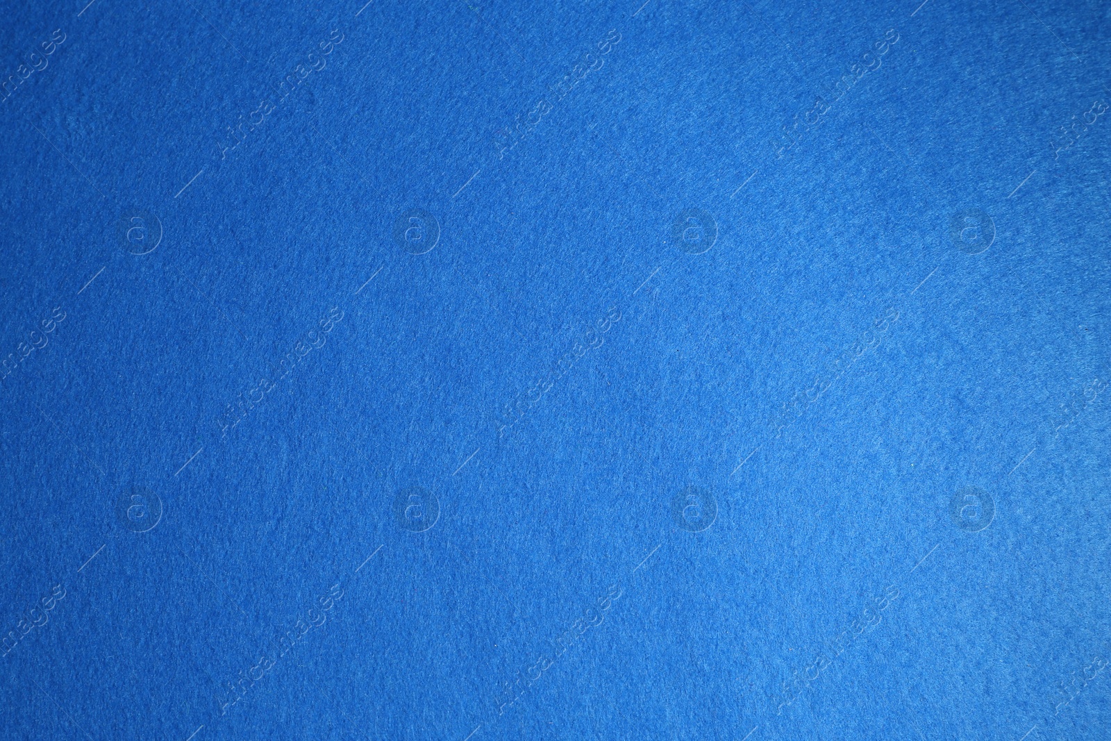 Photo of Blue textured surface as background, top view