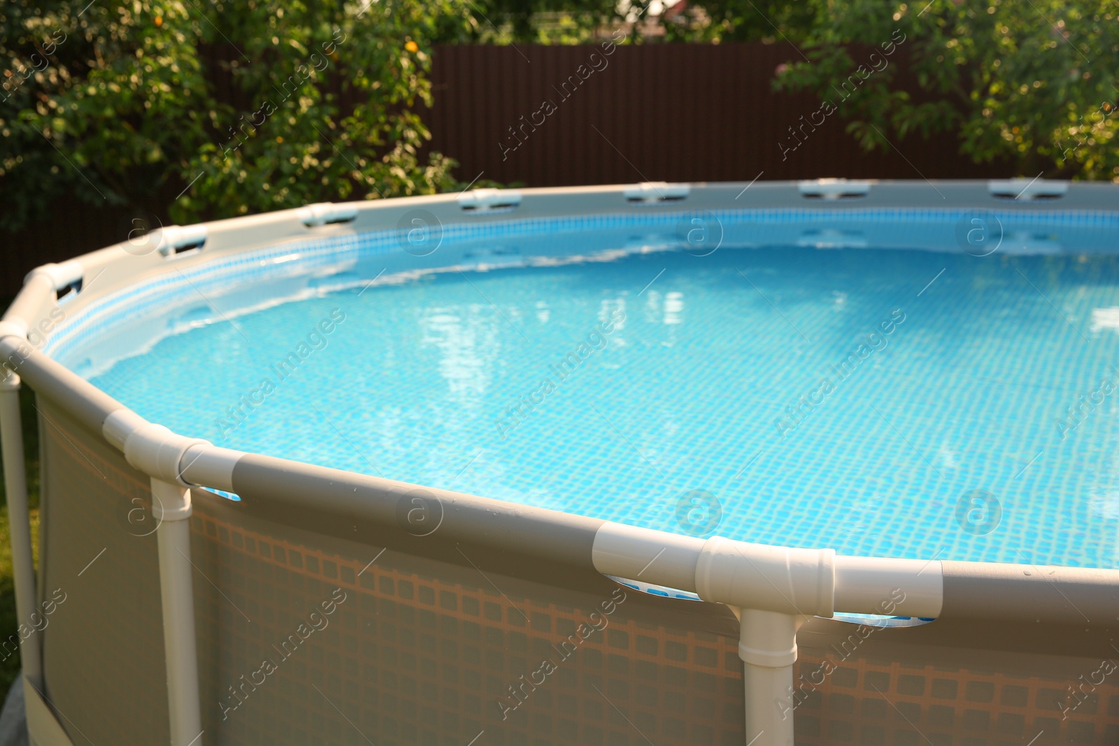 Photo of Above ground swimming pool outdoors on sunny day, closeup