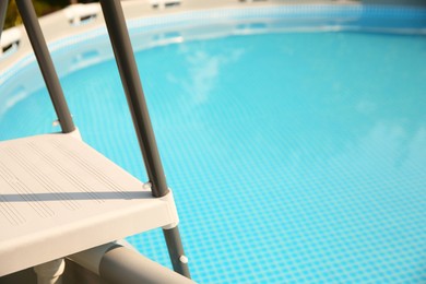 Photo of Above ground swimming pool outdoors on sunny day, closeup