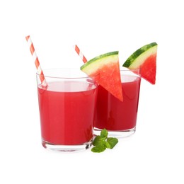 Photo of Tasty watermelon drink in glasses and mint isolated on white