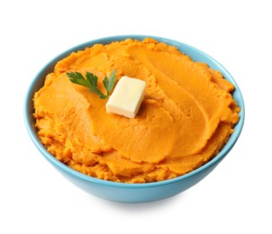 Photo of Tasty mashed sweet potato with butter and parsley in bowl isolated on white