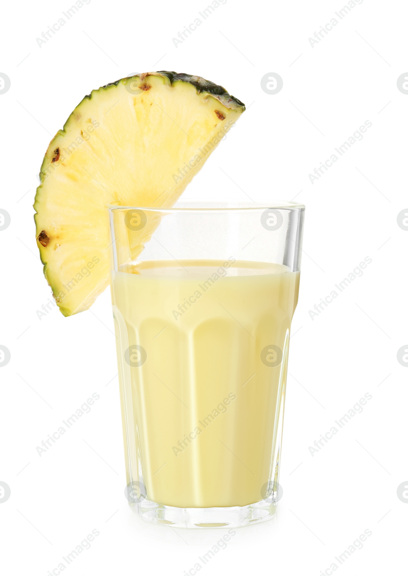 Photo of Tasty pineapple smoothie in glass and slice of fruit isolated on white