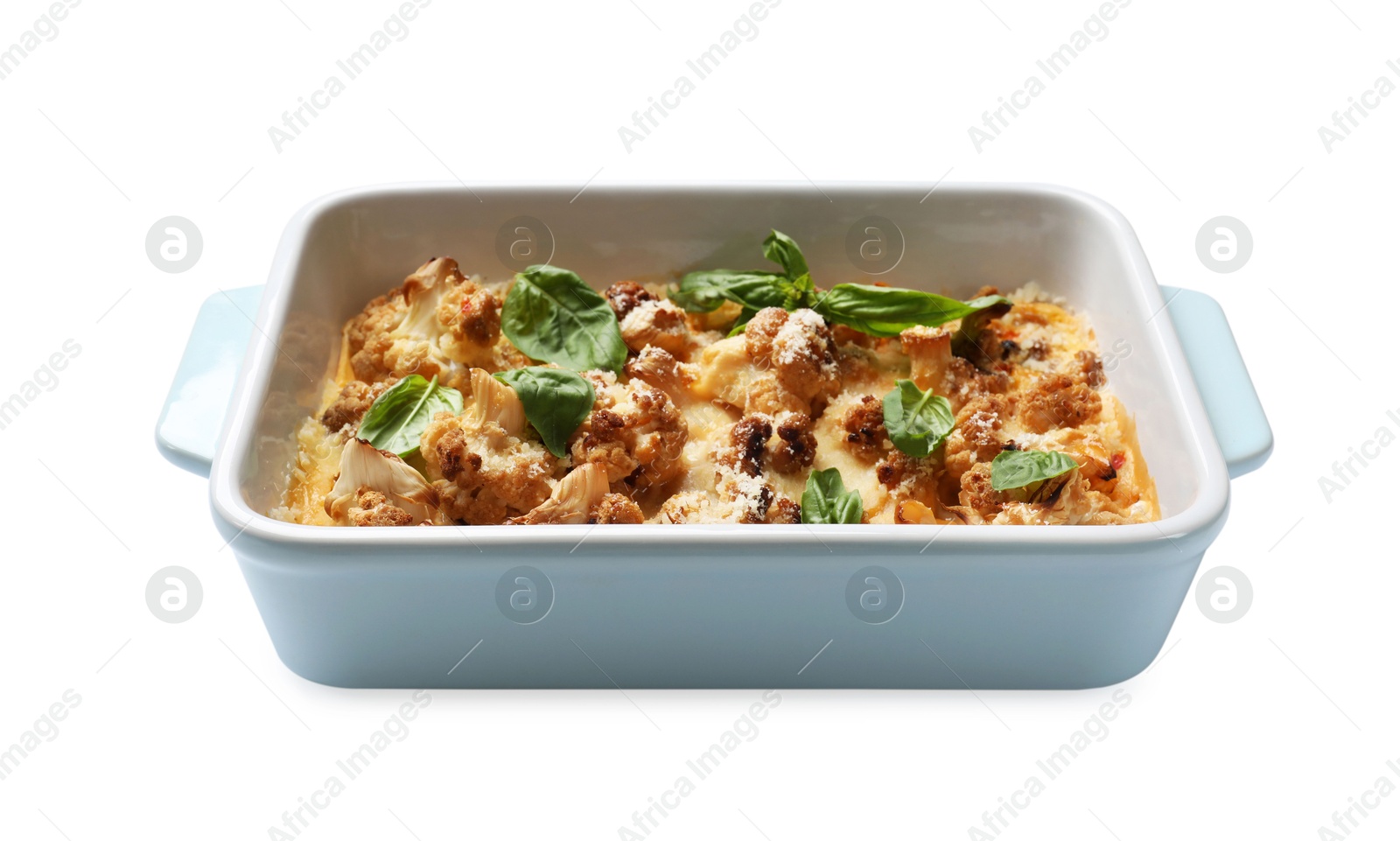 Photo of Tasty baked cauliflower and basil in baking dish isolated on white