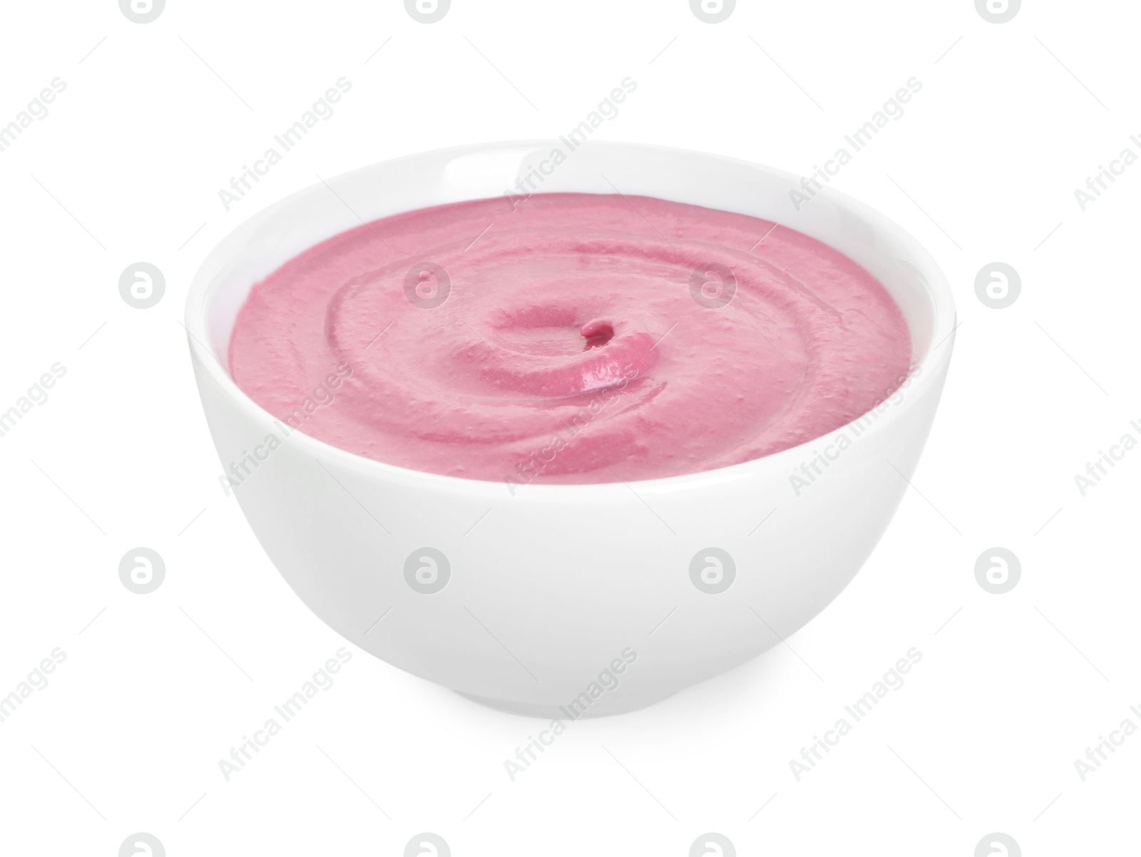 Photo of Tasty beetroot hummus in bowl isolated on white