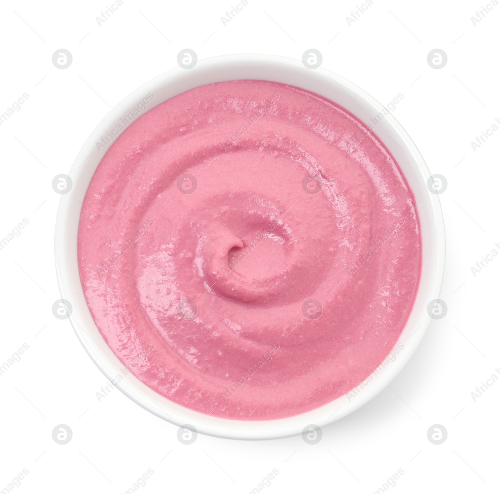 Photo of Tasty beetroot hummus in bowl isolated on white, top view