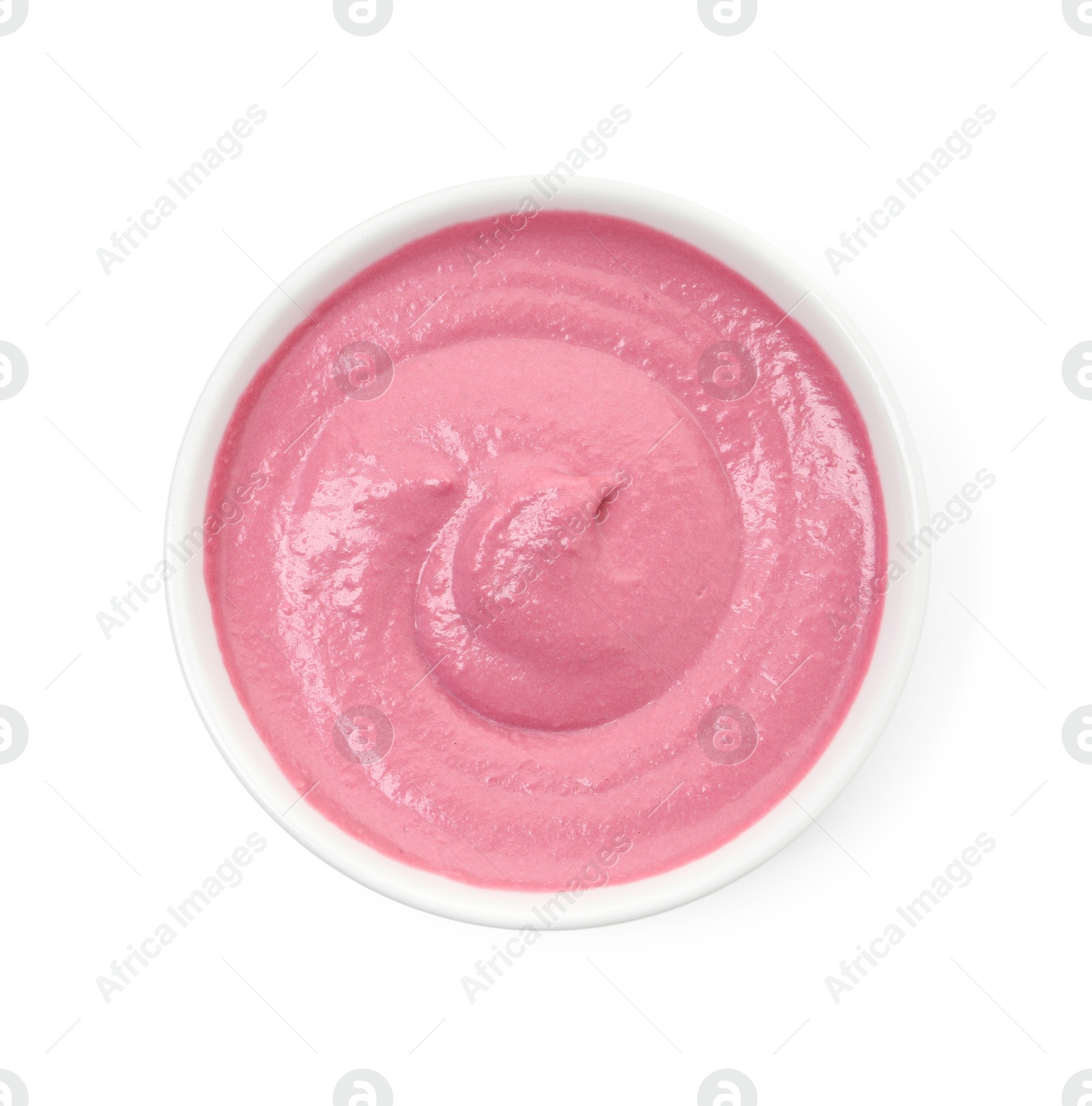 Photo of Tasty beetroot hummus in bowl isolated on white, top view