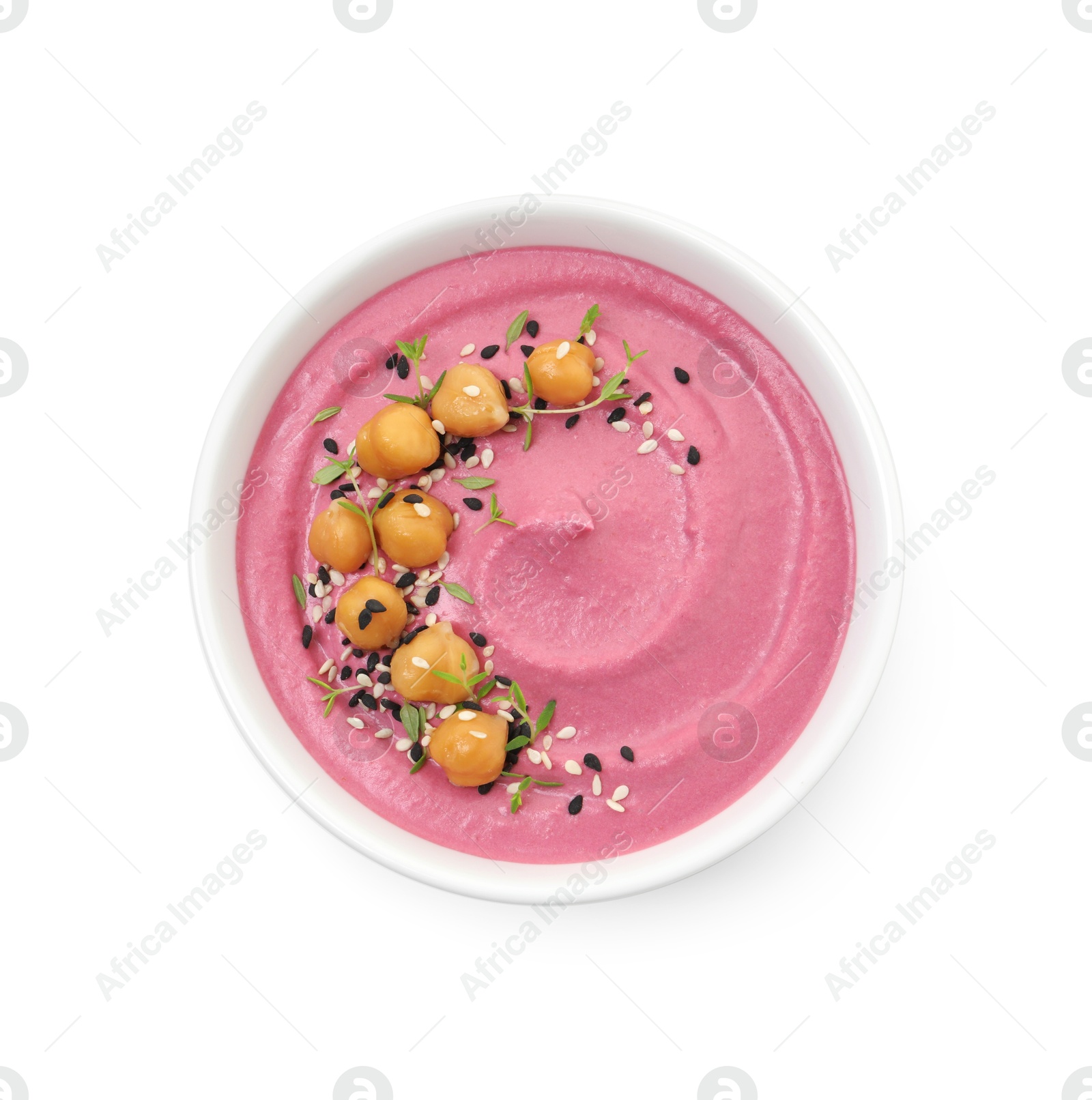 Photo of Tasty beetroot hummus and chickpeas in bowl isolated on white, top view