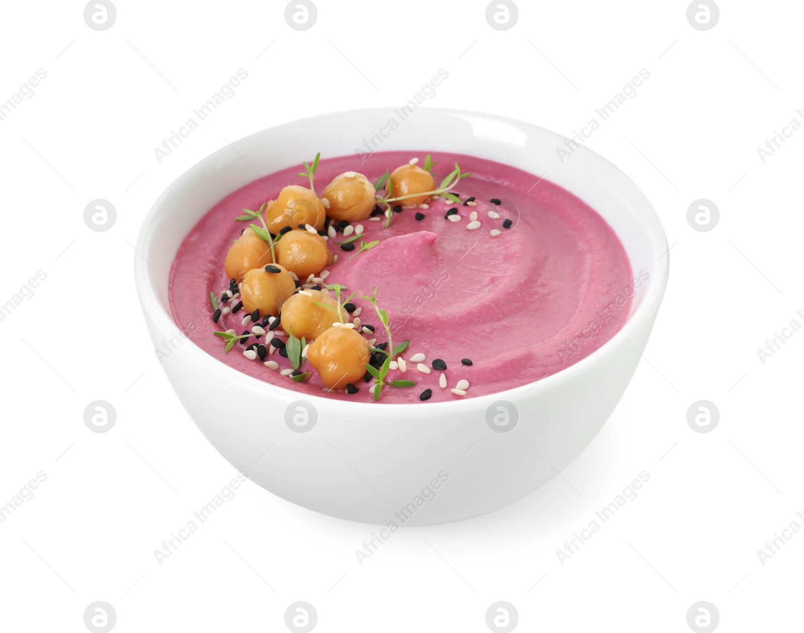 Photo of Tasty beetroot hummus and chickpeas in bowl isolated on white