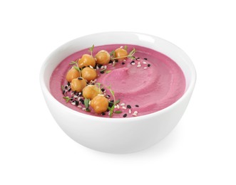 Photo of Tasty beetroot hummus and chickpeas in bowl isolated on white