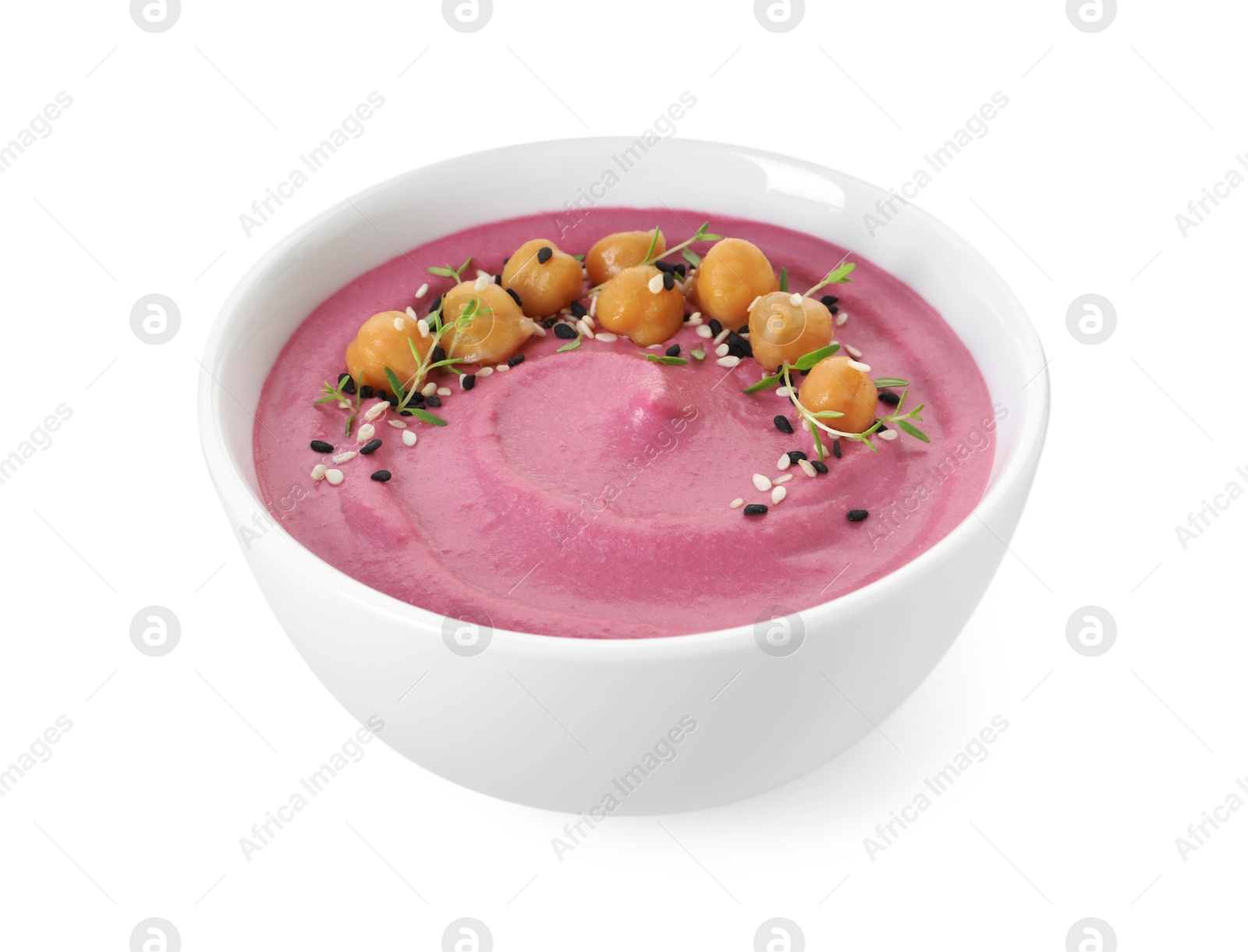 Photo of Tasty beetroot hummus and chickpeas in bowl isolated on white