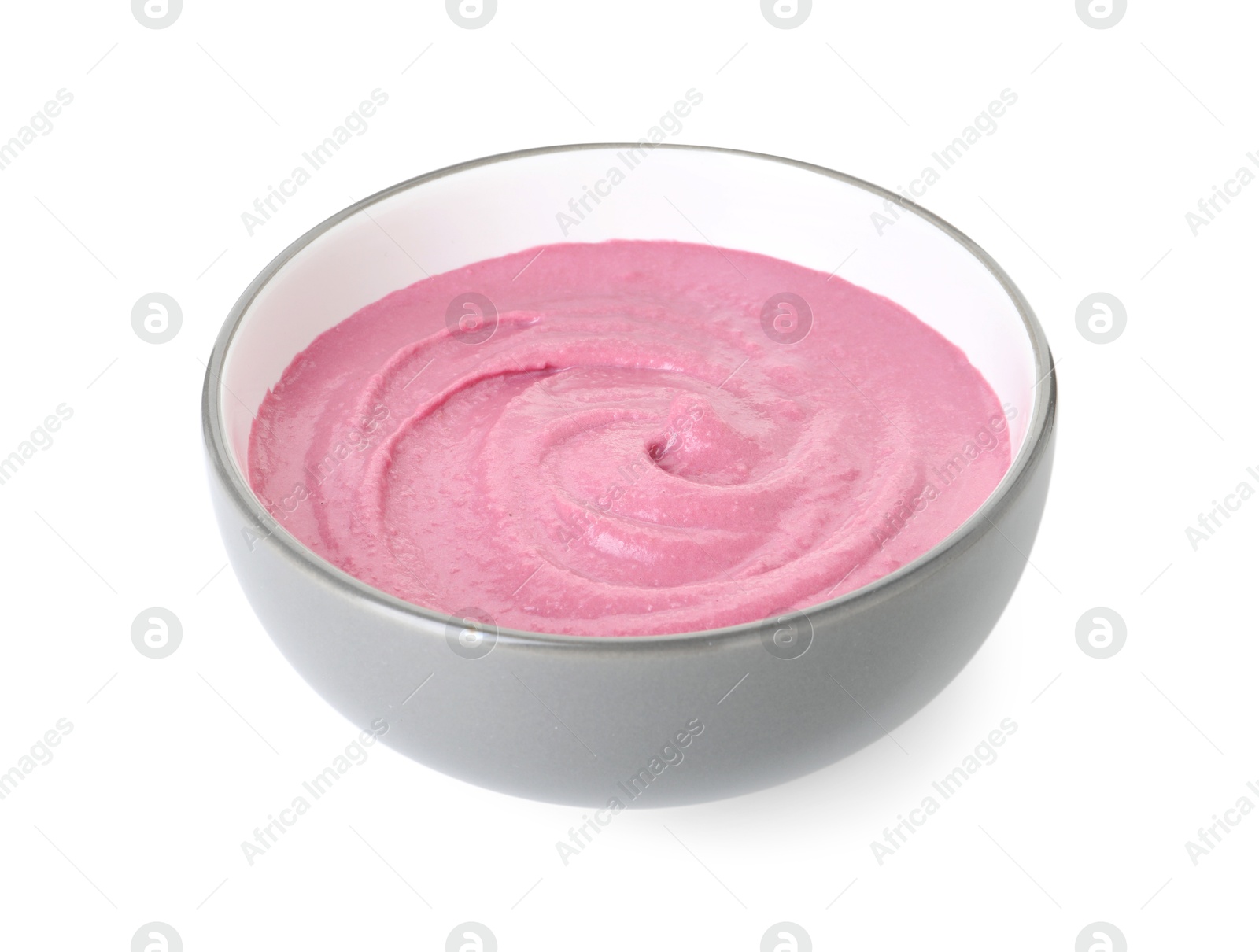 Photo of Tasty beetroot hummus in bowl isolated on white