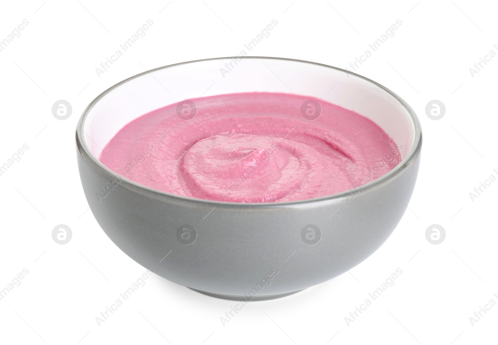 Photo of Tasty beetroot hummus in bowl isolated on white