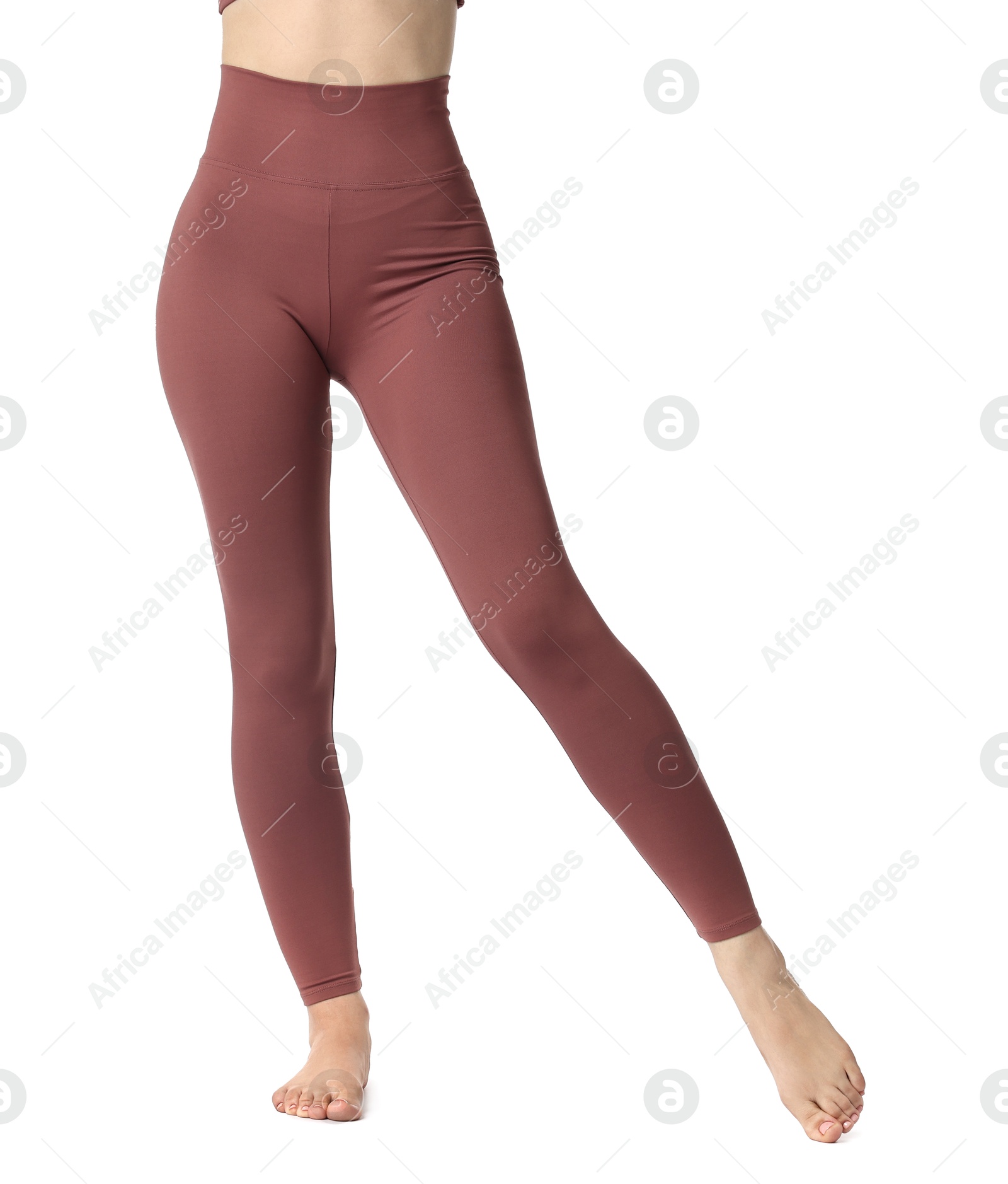 Photo of Woman wearing sports leggings on white background, closeup