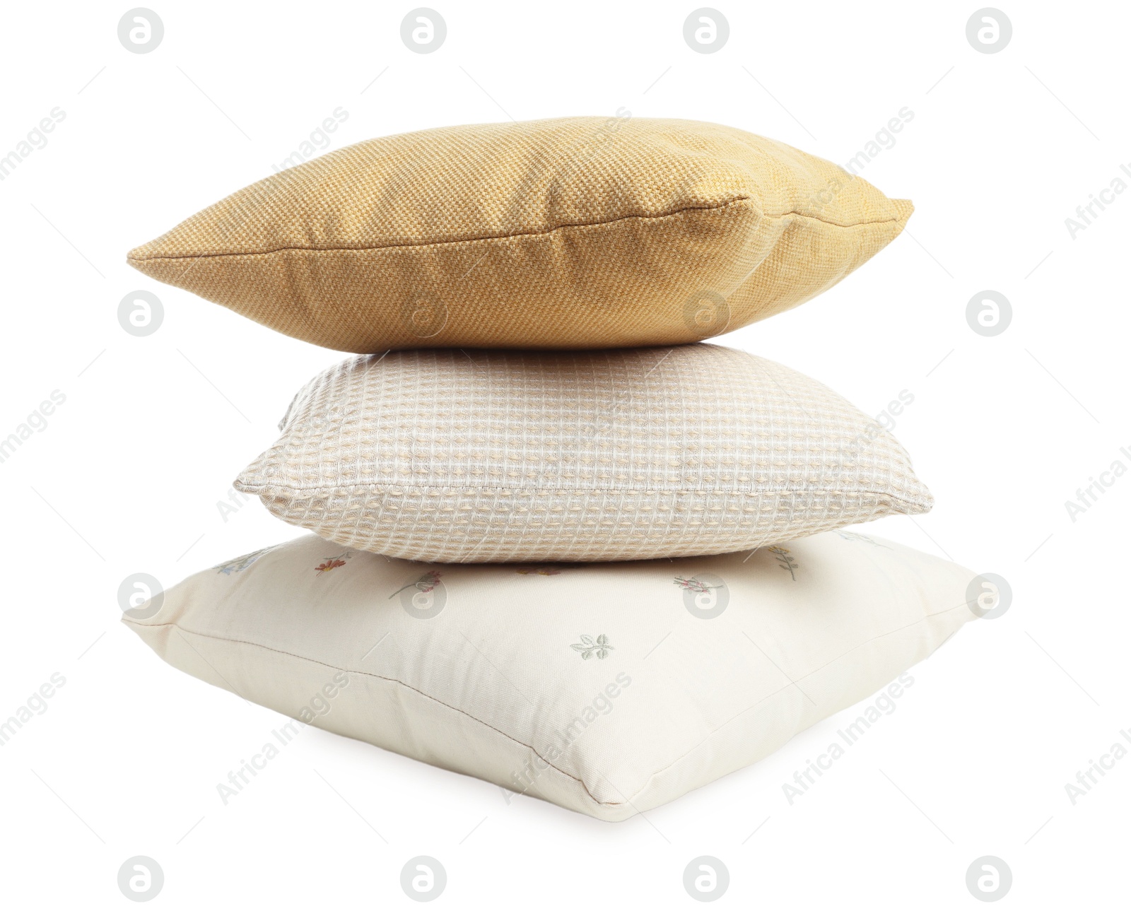 Photo of Stack of different pillows isolated on white