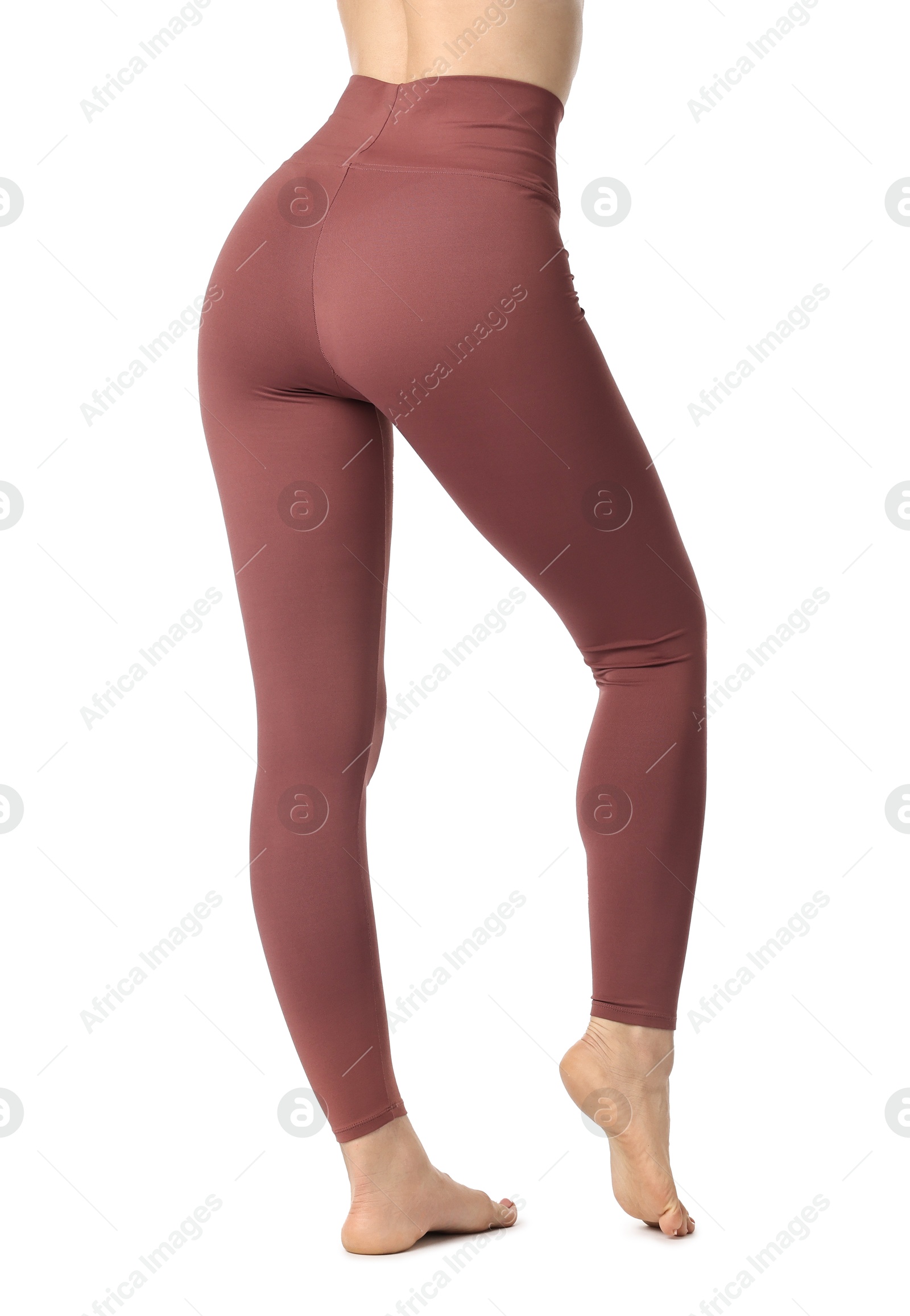 Photo of Woman wearing sports leggings on white background, closeup