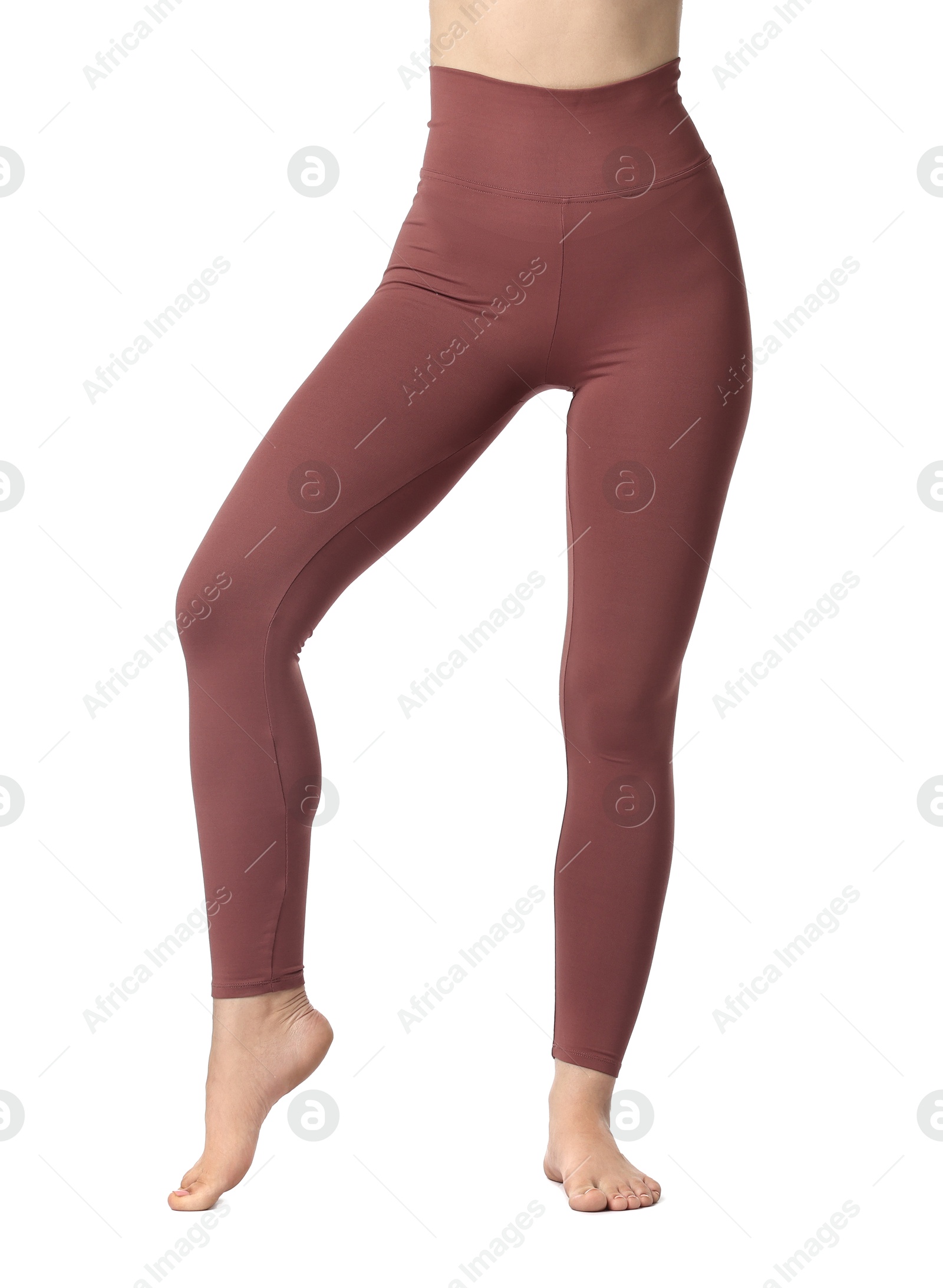 Photo of Woman wearing sports leggings on white background, closeup