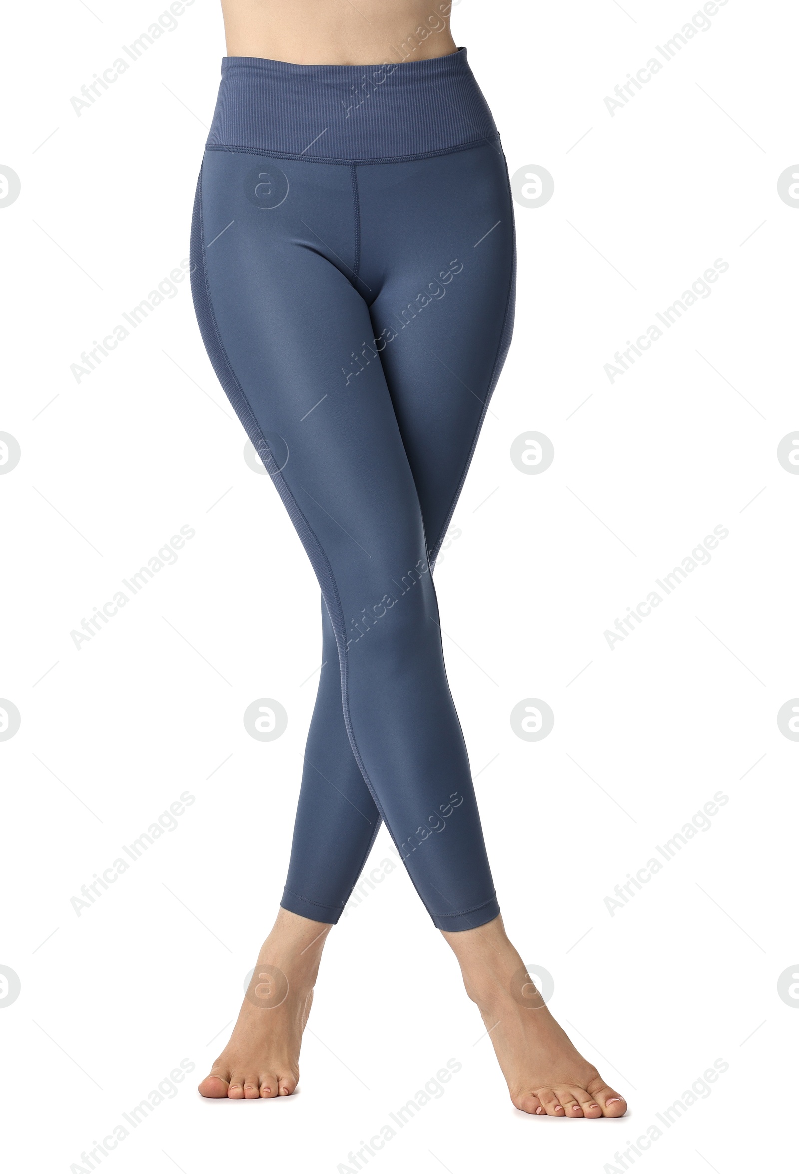 Photo of Woman wearing sports leggings on white background, closeup