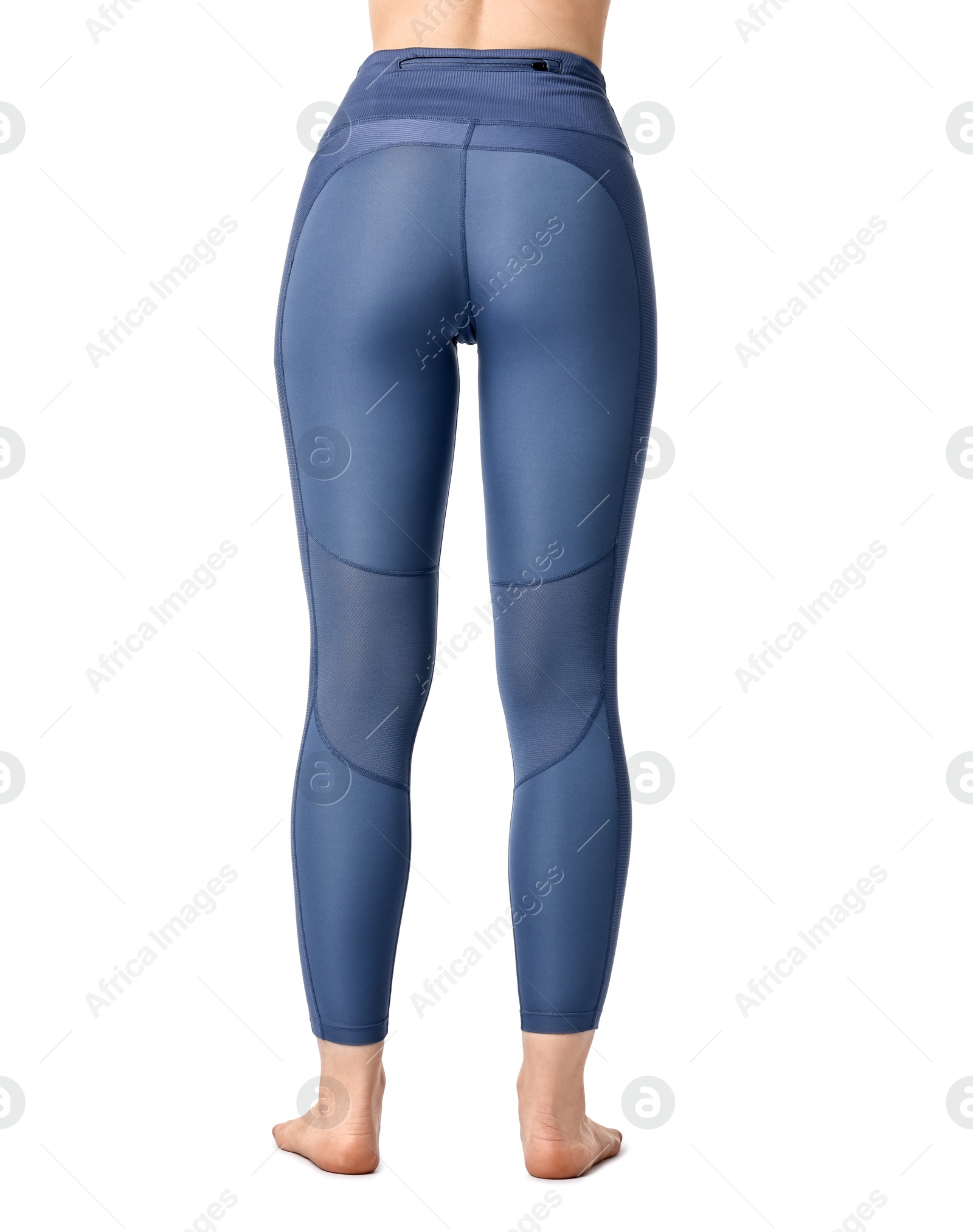 Photo of Woman wearing sports leggings on white background, closeup