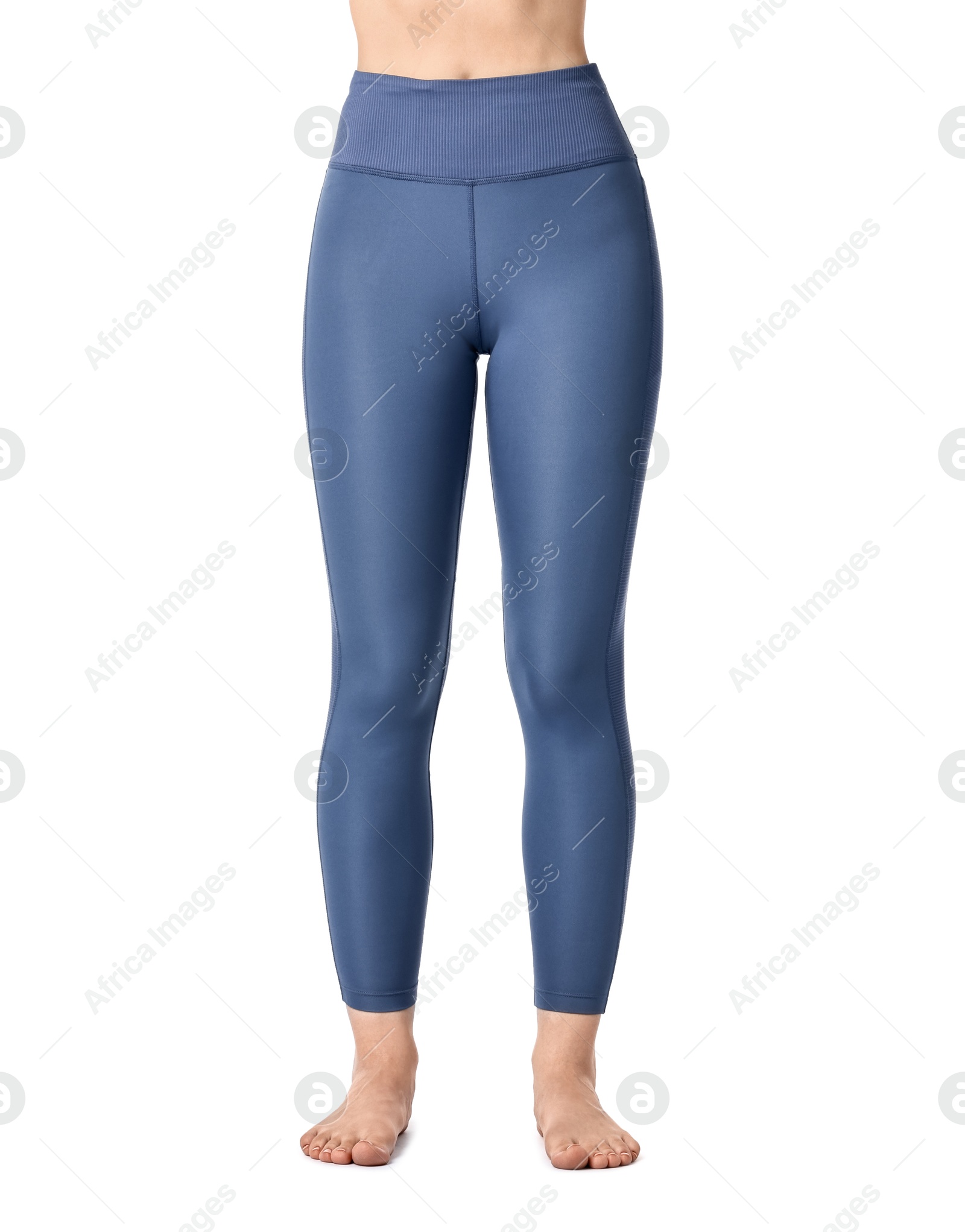 Photo of Woman wearing sports leggings on white background, closeup