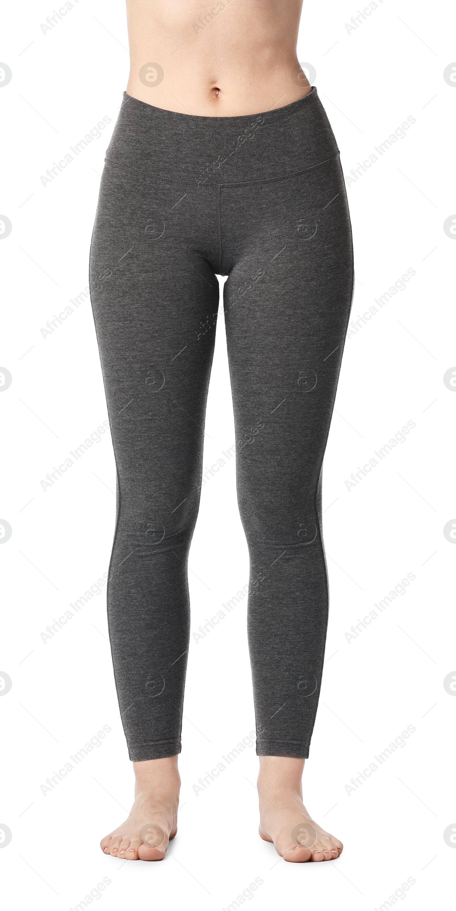 Photo of Woman wearing sports leggings on white background, closeup