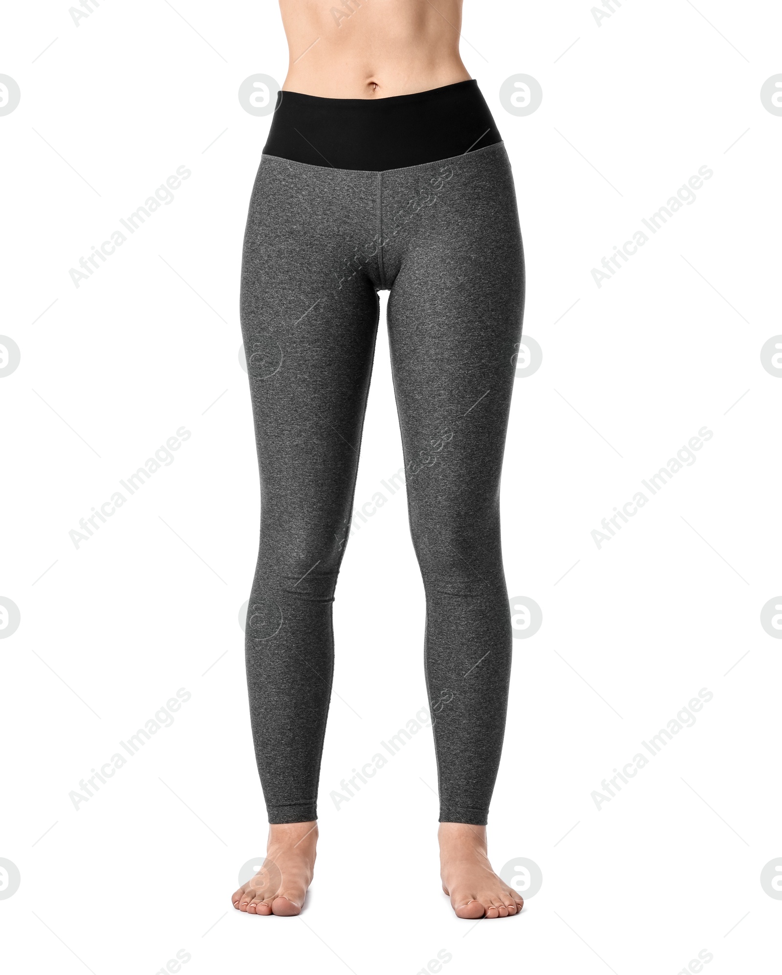 Photo of Woman wearing sports leggings on white background, closeup