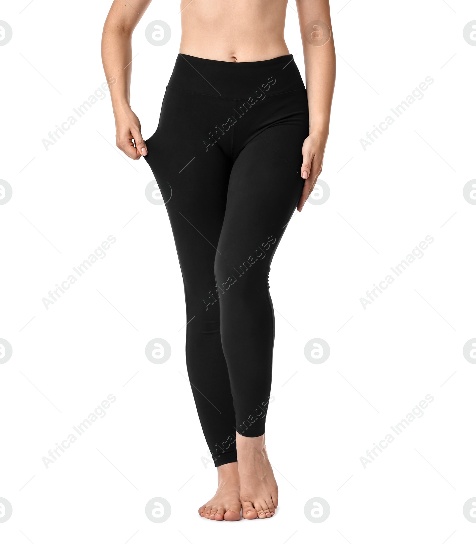 Photo of Woman wearing black sports leggings on white background, closeup